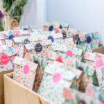 wedding gifts for the guests with a sticker that says "for you"